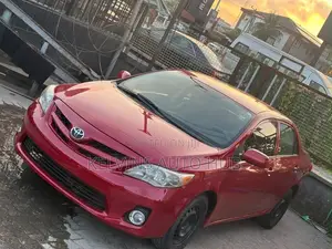Toyota Corolla L 4dr Sedan (1.8L 4cyl 5M) 2012 Red