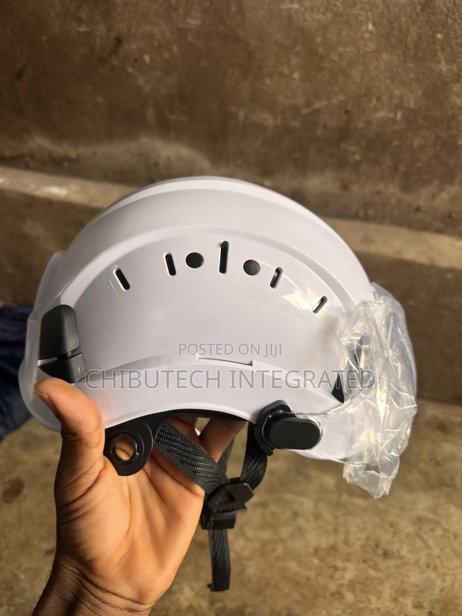 Chinstrap Helmet Equipped With Clear Face Shield Protective Plastic.