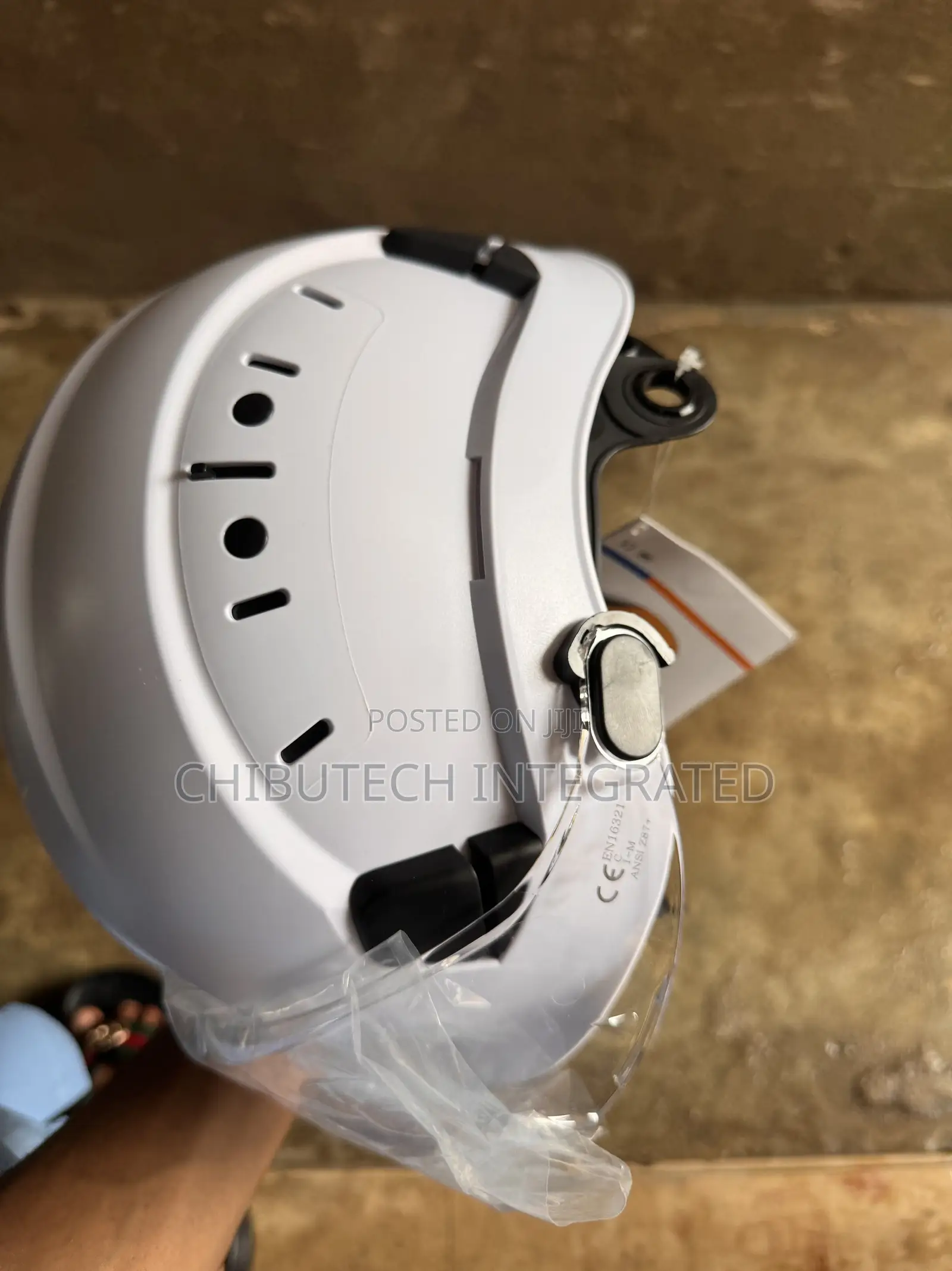 Chinstrap Helmet Equipped With Clear Face Shield Protective Plastic.