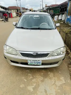 Mazda 323 1.6 2002 Silver