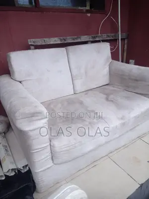 A Neatly Used 2 Seater Couch for Sale.