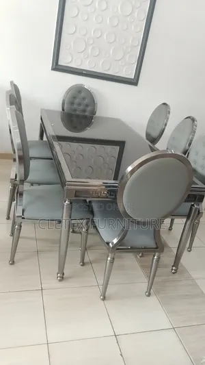 Tempered Glass Top Versace Dining Table by 8 Seaters