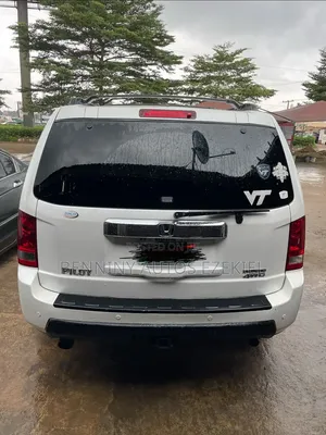 Honda Pilot Touring w/RES/Navi 4WD (3.5L 6cyl 5A) 2012 White