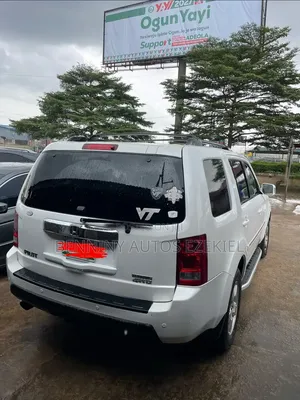 Honda Pilot Touring w/RES/Navi 4WD (3.5L 6cyl 5A) 2012 White