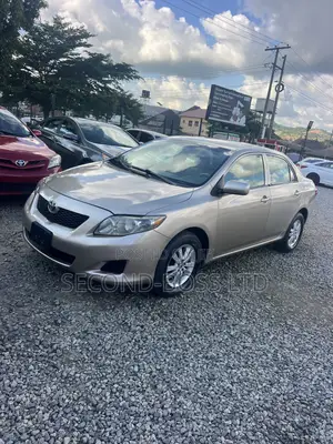 Toyota Corolla LE 4dr Sedan (1.8L 4cyl 4A) 2010 Gold