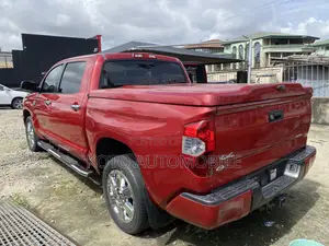 Toyota Tundra Platinum 4dr CrewMax 4WD SB (5.7L 8cyl 6A) 2014 Red