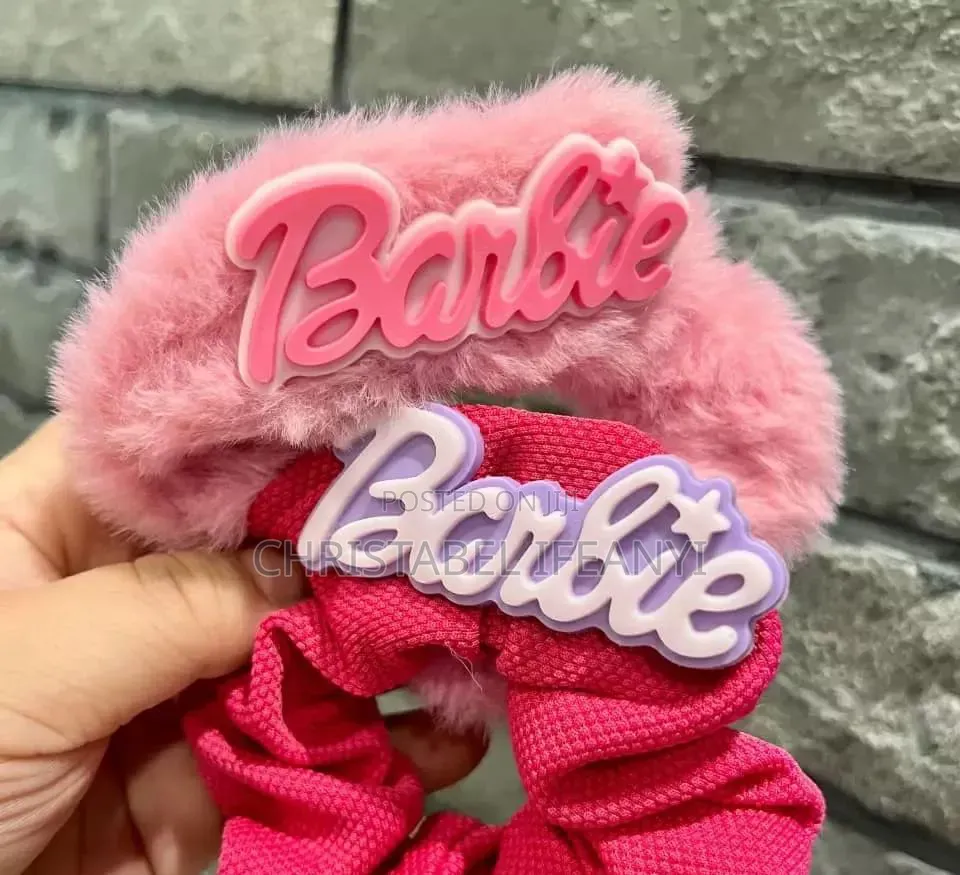 B. By Barbie