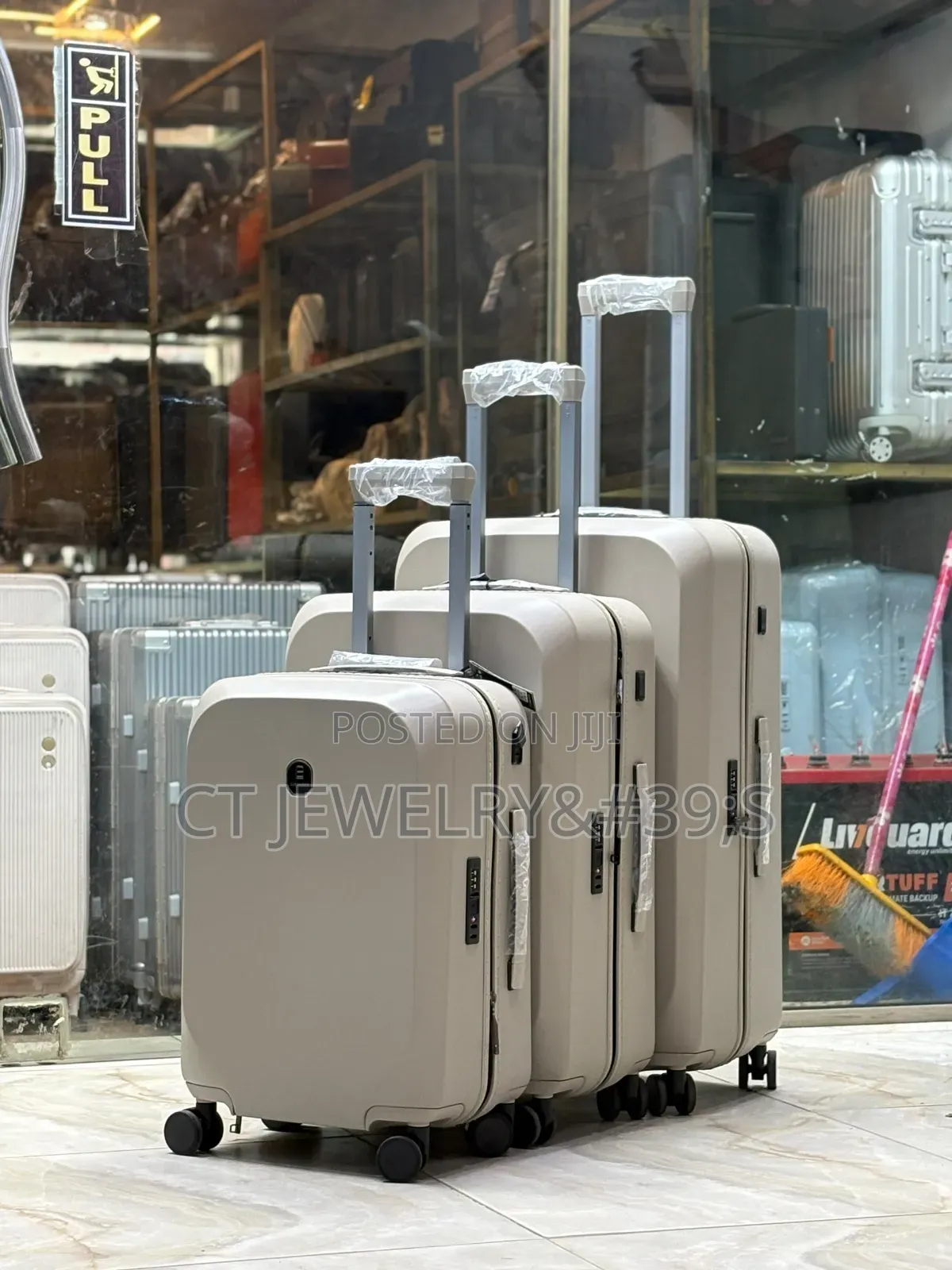 Hardside Trolley Suitcases With Telescoping Handles and Spinner Wheels