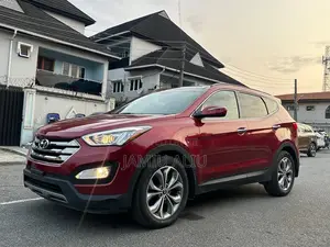 Hyundai Santa Fe Limited 4dr SUV AWD (3.3L 6cyl 6A) 2014 Red