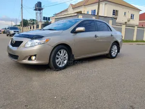 Toyota Corolla XLE 4dr Sedan (1.8L 4cyl 4A) 2010 Gold