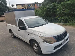 Mitsubishi L200 2011 White