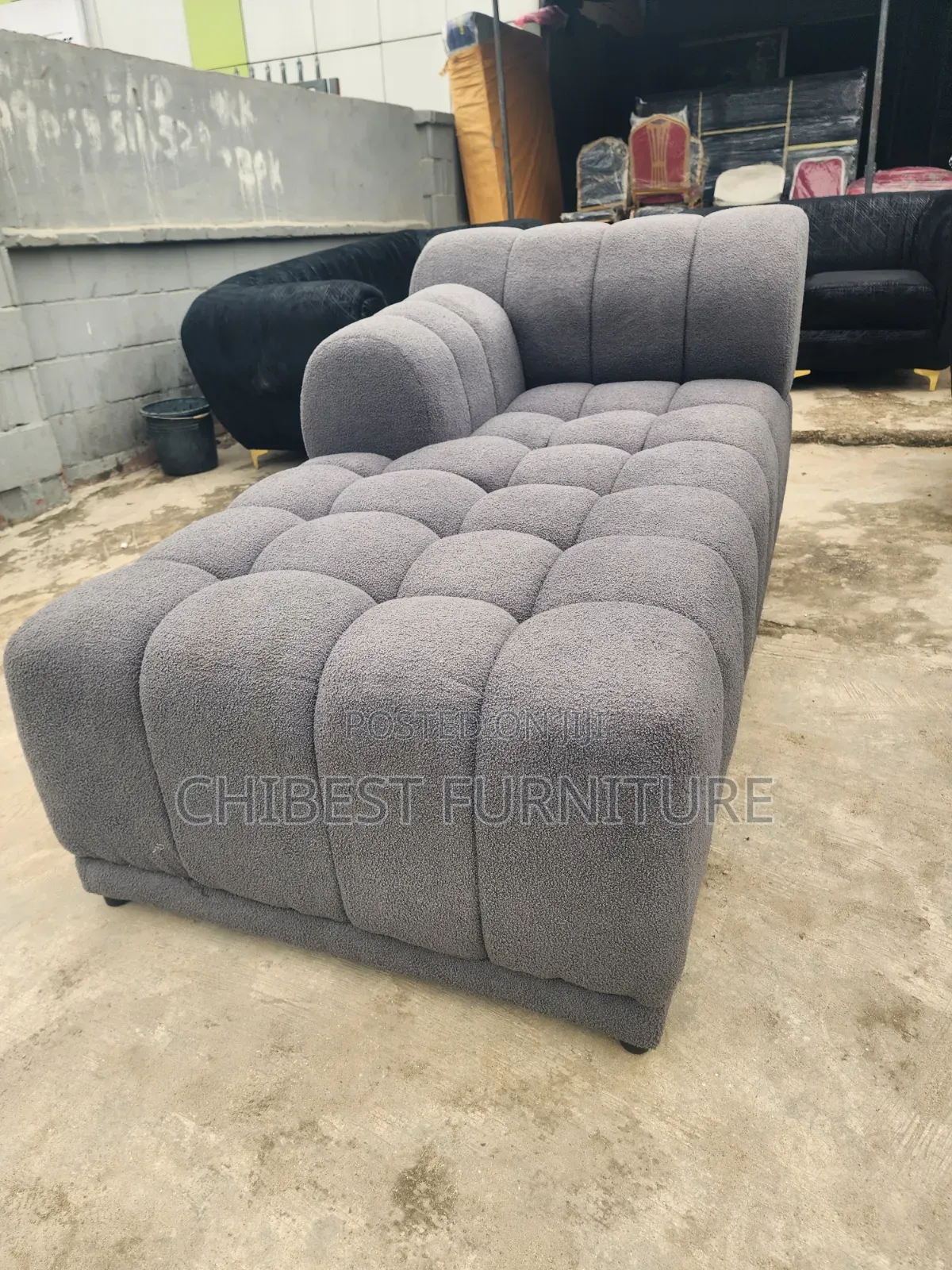 Neatly Padded L-Shaped Fabric Sofa.