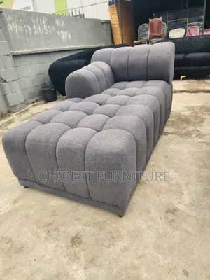 Neatly Padded L-Shaped Padded Sofa Chair.