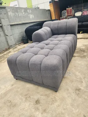 Neatly Padded L-Shaped Padded Sofa Chair.
