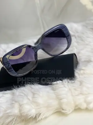 A Blue Cartier Sunglasses