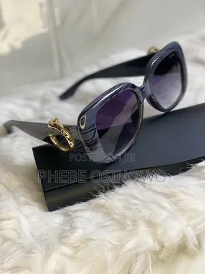 A Blue Cartier Sunglasses