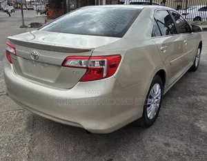Toyota Camry L 4dr Sedan (2.5L 4cyl 6A) 2014 Gold