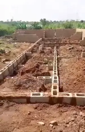 Half Plot of Land With Foundation for Sale