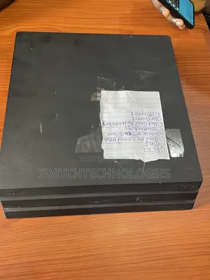 PlayStation 4Pro , 2 Pad , FC27 + 7 Games Installed