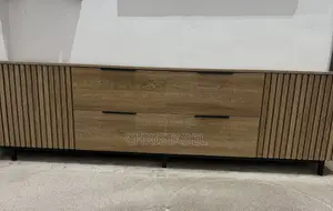 Fluted Wood TV Console With 4 Drawer Compartments