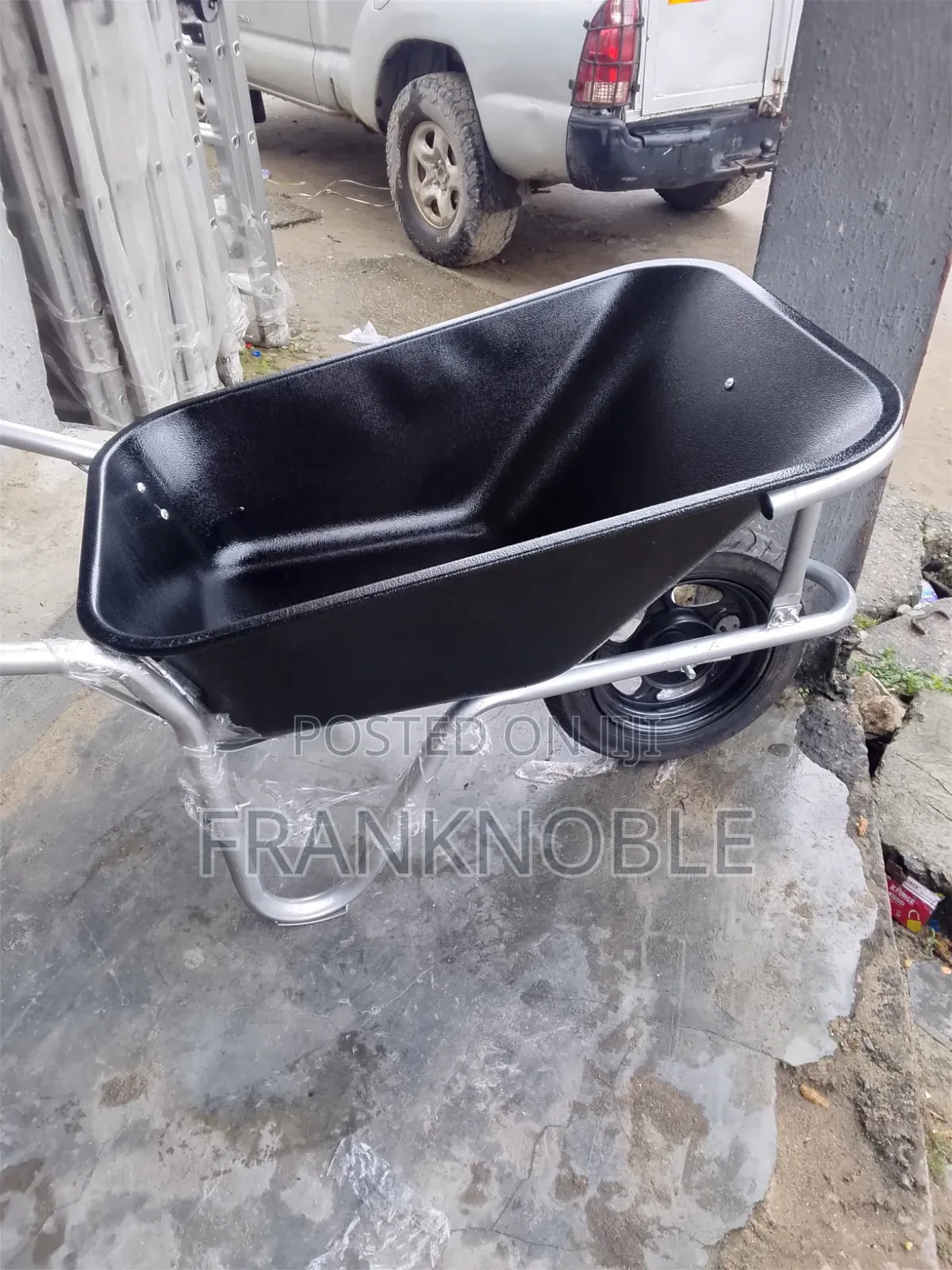 Black Foreign Wheel Barrow.