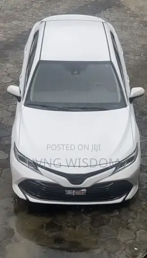 Toyota Camry LE (2.5L 4cyl 8A) 2019 White