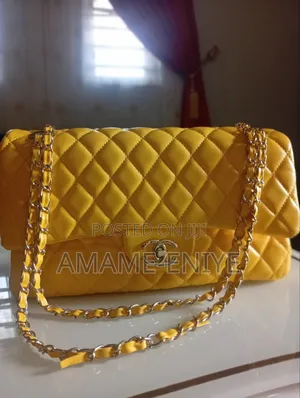 Luxury Yellow Quilted Chanel Flap Bag With Gold Chain