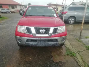 Nissan Frontier Crew Cab SE 4x4 Long 2009 Red
