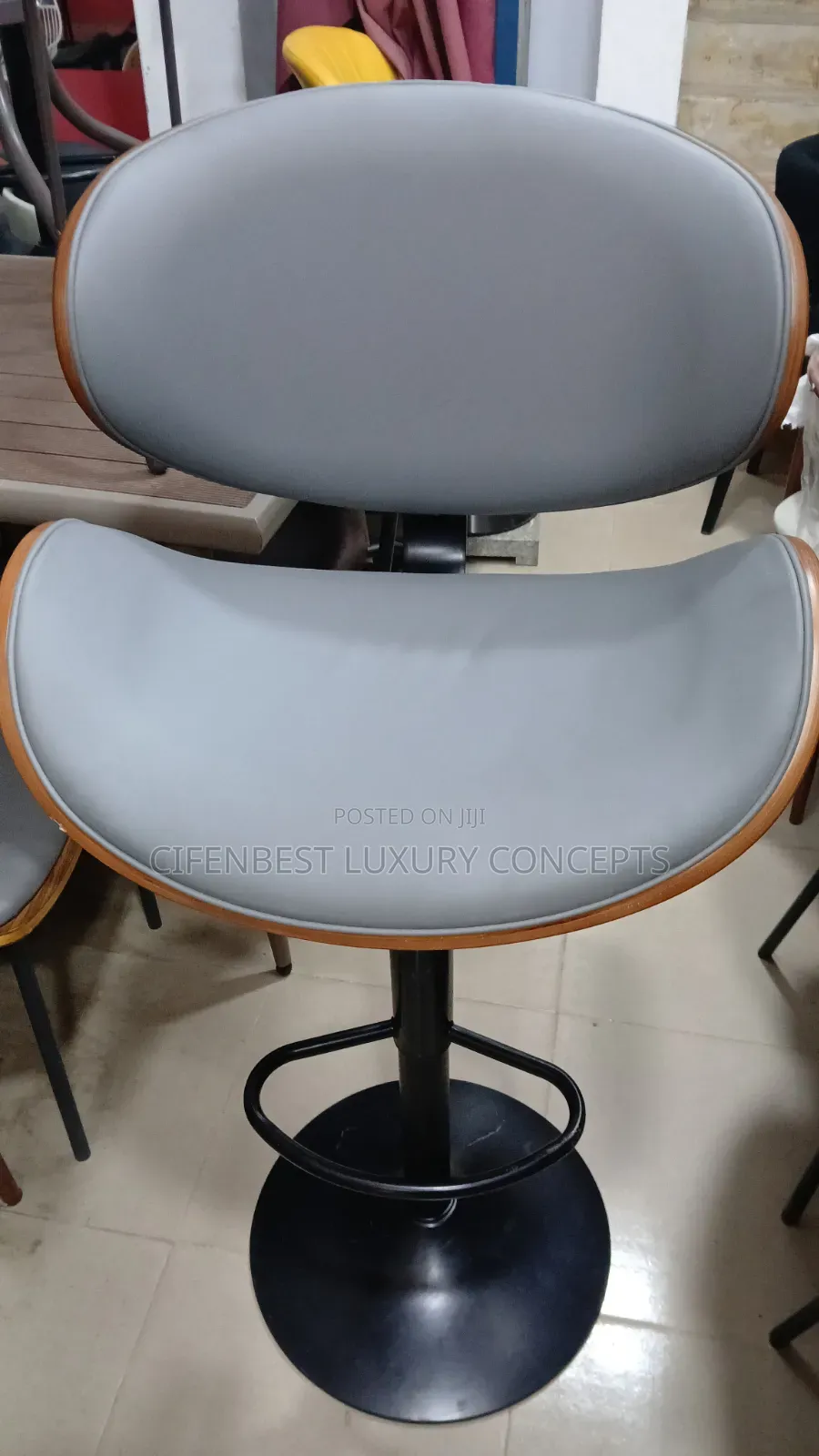 Unique Grey Rotational Bar Stool