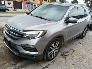 Honda Pilot Touring 4dr SUV 4WD (3.5L 6cyl 9A) 2016 Silver