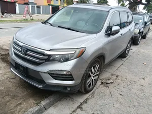 Honda Pilot Touring 4dr SUV 4WD (3.5L 6cyl 9A) 2016 Silver