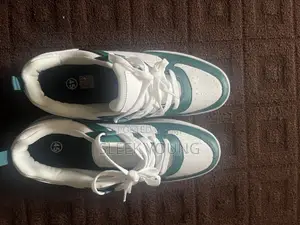 Men Neatly Bough Sneakers and Never Been Worn