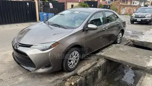 Toyota Corolla LE Eco (1.8L 4cyl 2A) 2018 Brown