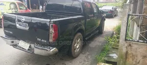 Nissan Frontier Crew Cab LE 4x4 Long 2010 Black