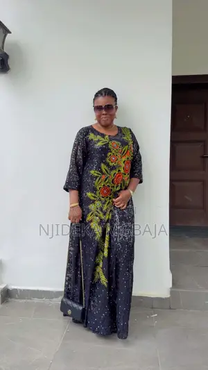 Elegant Black Lace and Ankara Maxi Gown With Floral Embroidery