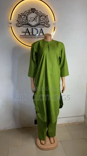 Elegant Green Two-PieceSet Stylish With Matching Trousers.