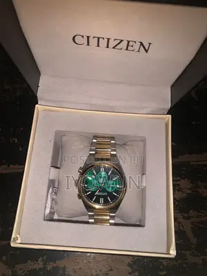 Citizen Eco-Drive Sport Chronograph - Two-Tone With Green Dial.
