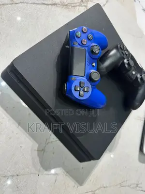 Ps4 Slim With Two Pads and 9 Games