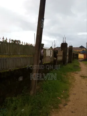 Empty Land With a Very High Fence
