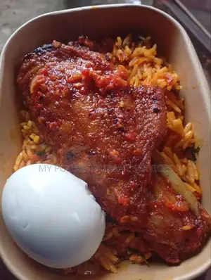 A Pack of Native Jollof Rice With Turkey