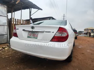 Toyota Camry LE 4dr Sedan (2.4L 4cyl 5M) 2003 White