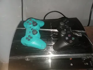 Playstation 3 Complete With 10 Games and 2 Pads