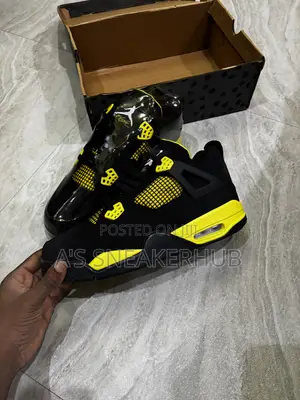 Air Jordan 4 Retro "Thunder" Sneakers