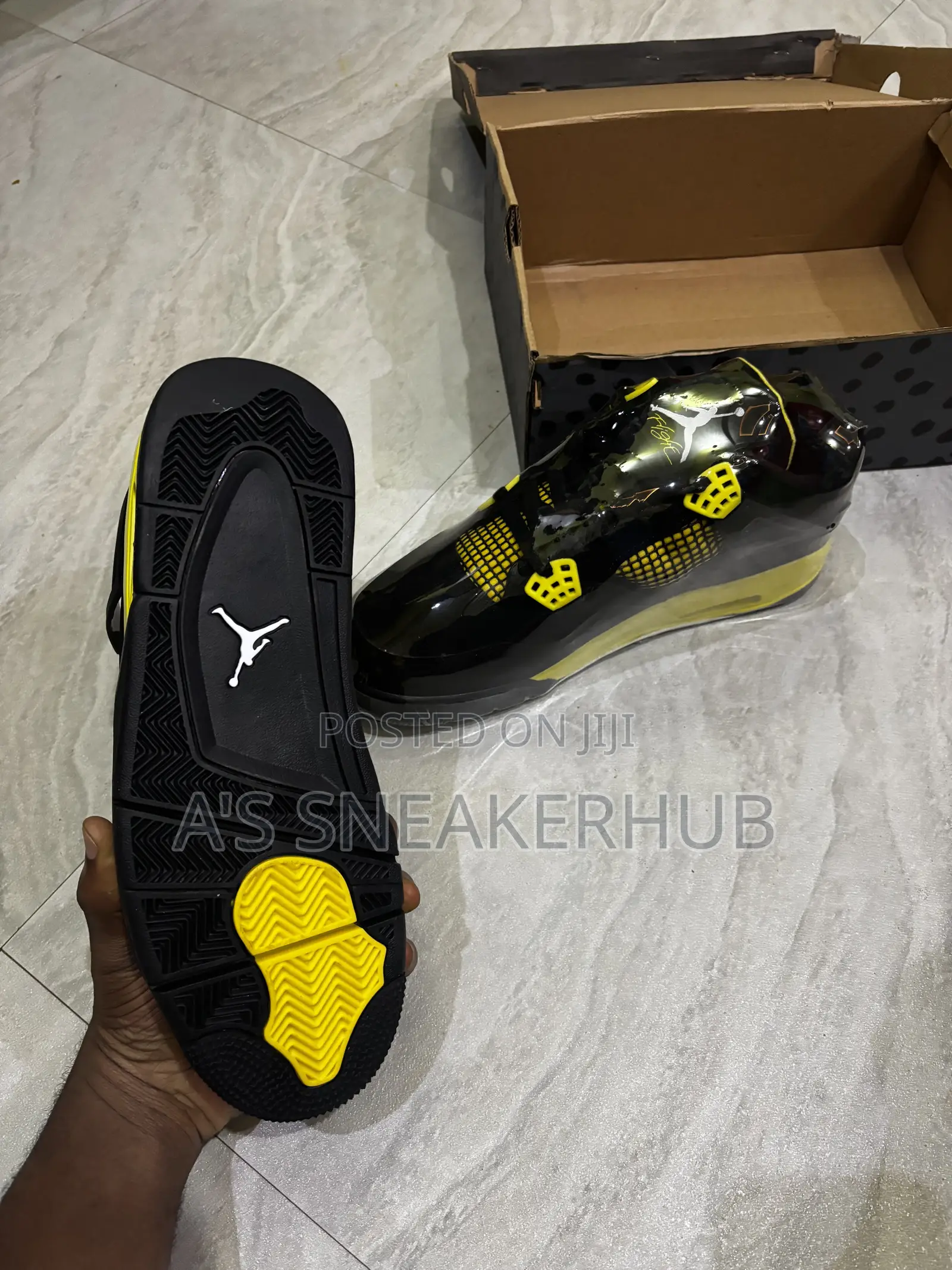 Air Jordan 4 Retro "Thunder" Sneakers
