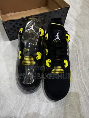 Air Jordan 4 Retro "Thunder" Sneakers