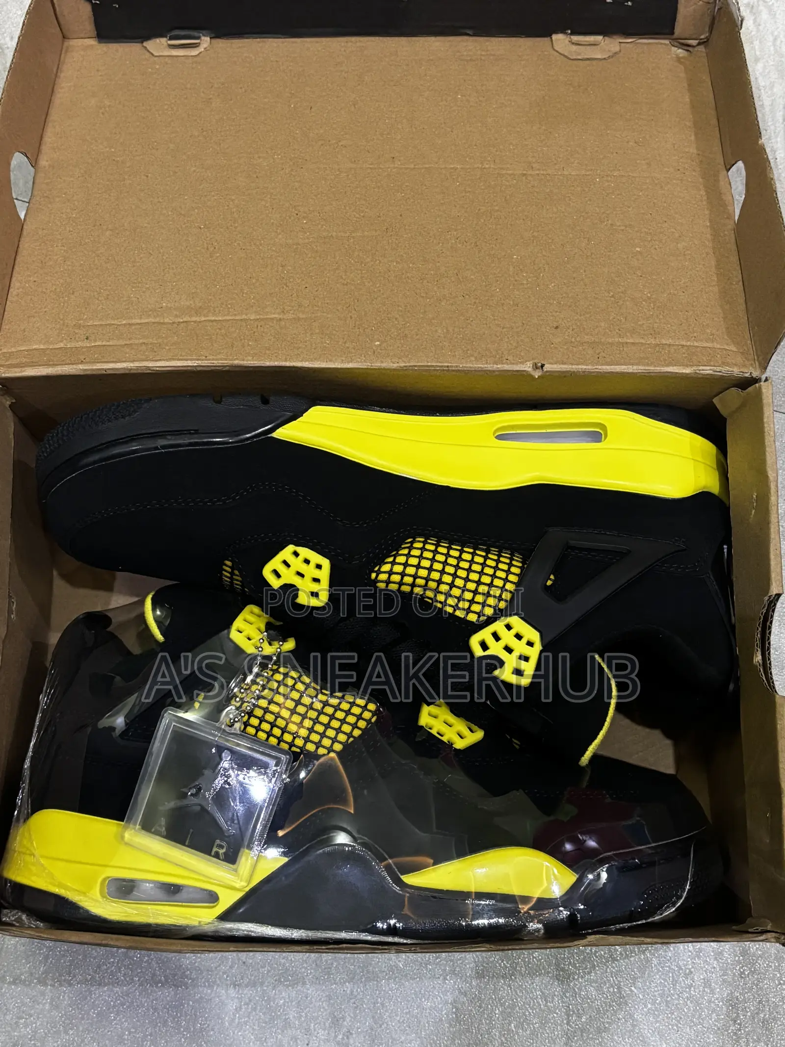 Air Jordan 4 Retro "Thunder" Sneakers