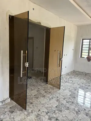 Brown Tinted Tempered Glass Swing Door – Custom Made Installed