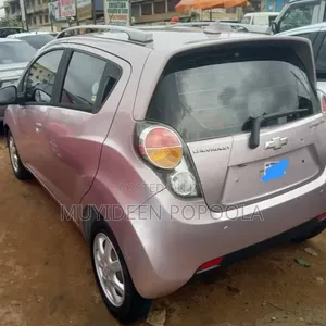 Chevrolet Spark 2012 Pink