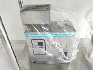 Fz 100 Weighing and Filling Machine