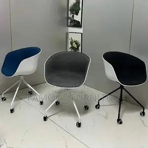 Modern Rolling Swivel Bucket Chairs Feature an Ergonomic Curve
